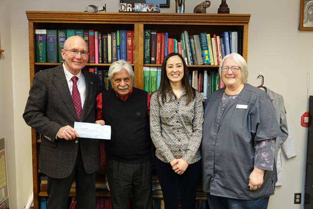 IVCC President Jerry Corcoran, left, accepts a check for $44,131 from La Salle County Medical Society President Dr. Amar Dave of Ottawa who was joined by daughter Pahroul Dave, a family nurse practitioner, and IVCC Foundation President Dr. Sue Schmitt. 