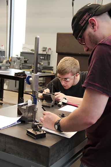 students working with tool and die makers