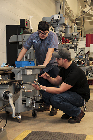 students working on machines