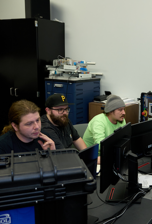 Engineering Tech students working on computer